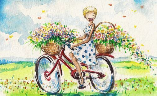 Uśmiechnięta dziewczyna na rowerze