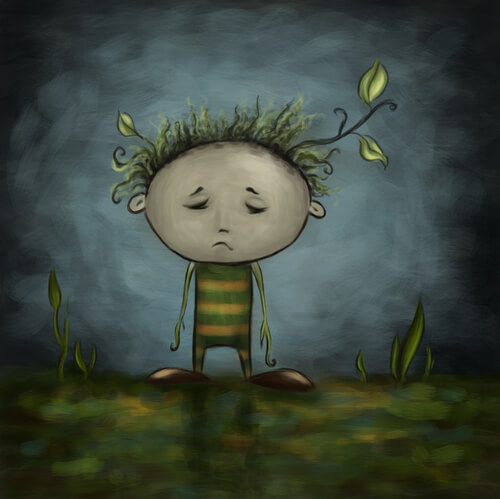 Smutny chłopiec z liściem na głowie