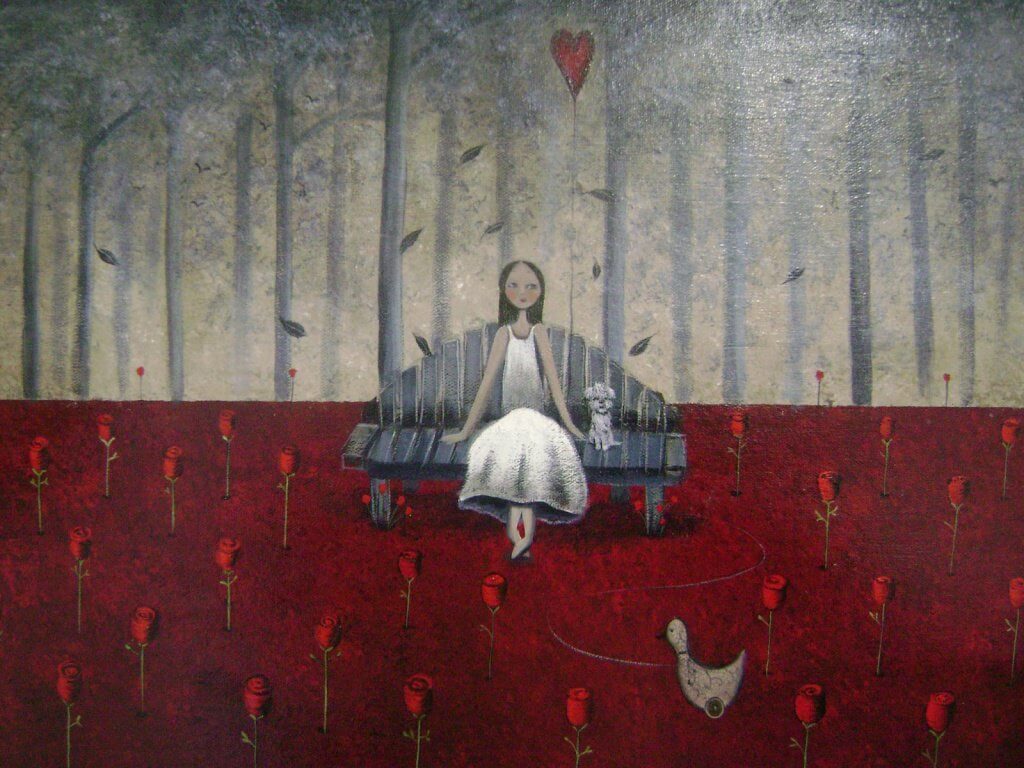 Kobieta siedząca na ławce z psem