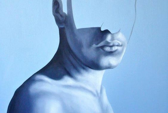 Mężczyzna, którego twarz jest w połowie niewidoczna