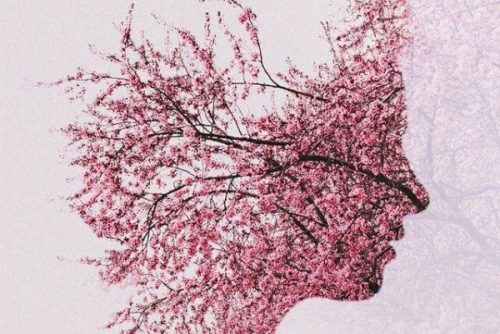 Choroba Alzheimera przedstawiona jako porośnięta kwiatami twarz