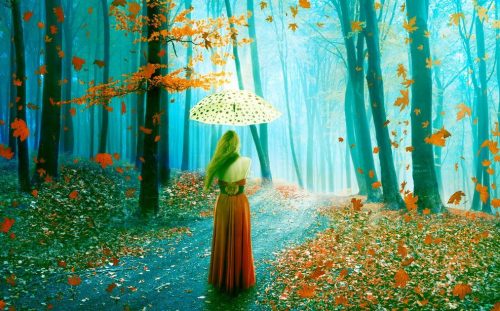 Dziewczyna z parasolem w lesie
