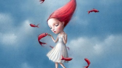 Dziewczyna z czerwonymi włosami i rybami