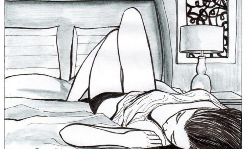 Kobieta sama w łóżku