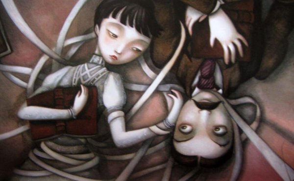 Zależność - para leżąca na podłodze połączona więzami.