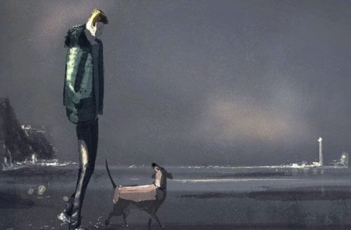 Samotny człowiek z psem na brzegu morza