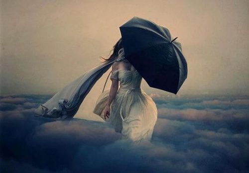 Nieszczęście - kobieta w chmurach z parasolem 