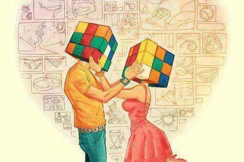 Nieporozumienia - para z kostkami Rubika zamiast głów.