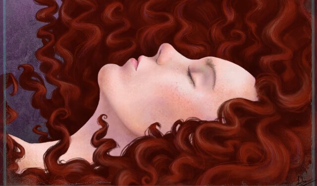 Rudowłosa śpiąca kobieta.