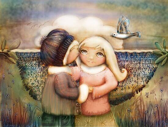 Chłopic całuje dziewczynkę.