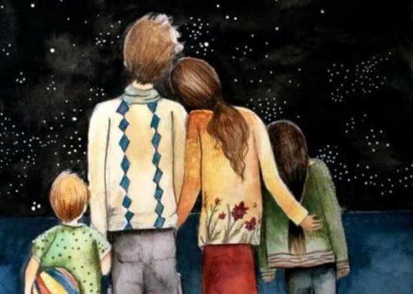 Szczęśliwa rodzina patrząca w gwiazdy.