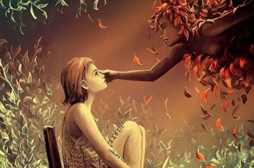 Dziewczyna siedzi na krześle, gdy dotyka jej anioł