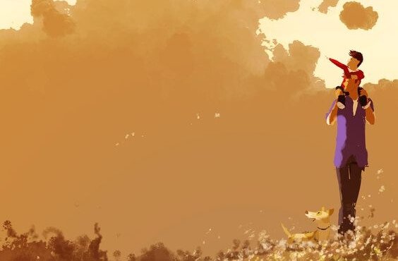 Ojciec niosący syna na barana.