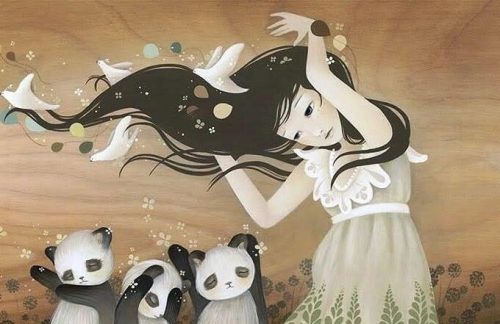 Dziewczyna i trzy pandy stoją na wietrze