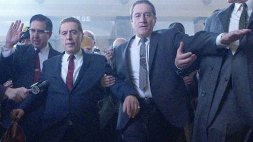 Mężczyźni w garniturach