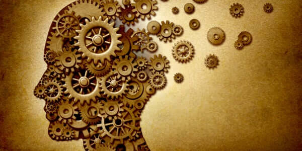Głowa z rozpadających się kół zębatych - trening pamięci