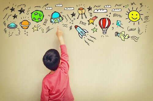 Dziecko rysujące na ścianie